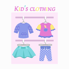 Kid's clothing store. Skirt, jumper and pants in cute colors.