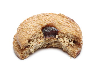 Cookie with cherry jam, marmalade filled biscuit bitten in half isolated on white background