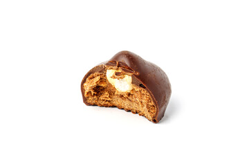 Bitten chocolate candies with nuts isolated on white