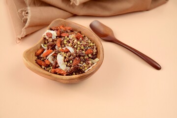 Homemade chocolate granola with buckwheat, goji berry, raisin and coconut chips