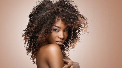  Beautiful black woman . Beauty portrait of african american woman with clean healthy skin on white...