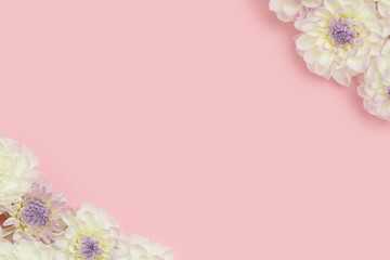 Frame made of white dahlia flowers. Springtime concept with copyspace.