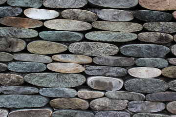 Gray stone wall closeup image . Horizontal image