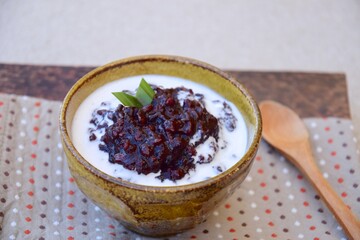Bubur ketan hitam,  an Indonesian sweet dessert made from black glutinous rice porridge with coconut milk and palm sugar 