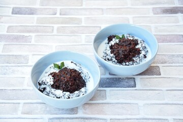 Bubur ketan hitam,  an Indonesian sweet dessert made from black glutinous rice porridge with coconut milk and palm sugar 