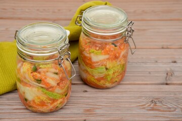 Kimchi Napa Cabbage in glass jar. Korean traditional cuisine. Fermented food.