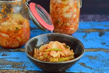 Kimchi, traditional Korean food, fermented Napa cabbage and radish with seasoning