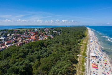 Sunbathing on the beach by the sea. Aerial drone view of  Baltic Sea coast in Hel peninsula,...