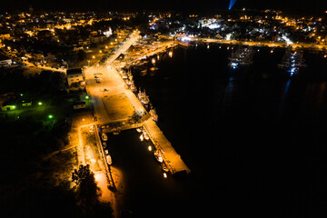 Night aerial view of marina in Jastarnia. Hel peninsula harbor in Puck Bay Baltic Sea Poland drone. Marina, harbor at night