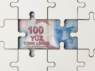 White jigsaw puzzle with Turkish lira	