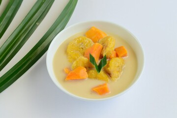 Indonesian Food - Kolak Pisang Ubi, Plantain banana and sweet potato, cooked in coconut milk, palm sugar and pandanus leaves