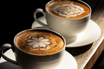 Cups of coffee cappuccino with frothy foam