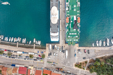 Aerial overhead drone shot of ferry cruise at Vis Island port in Adriatic sea in Croatia summer