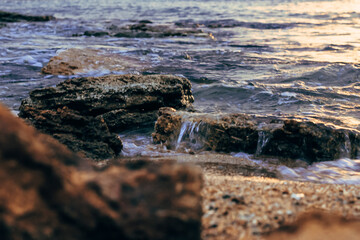 Blurred abstract natural background of sea water with waves and foam. Motion blur. Nature. 