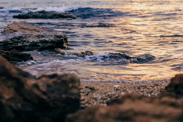 Blurred abstract natural background of sea water with waves and foam. Motion blur. Nature. 