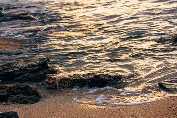 Blurred abstract natural background of sea water with waves and foam. Motion blur. Nature. 