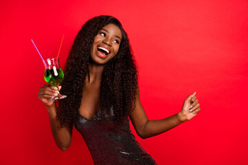 Photo of young cheerful afro girl happy positive smile have fun drink alcohol party isolated over...
