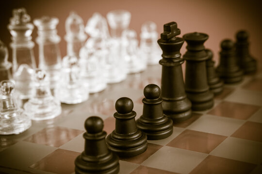 chess isolated on brown background. Image with selective focus. copy space area.
