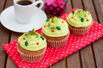 Christmas cupcake. Muffin with matcha green tea frosting. Served with espresso coffee