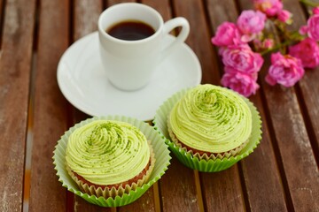 Matcha cupcakes with a cup of espresso
