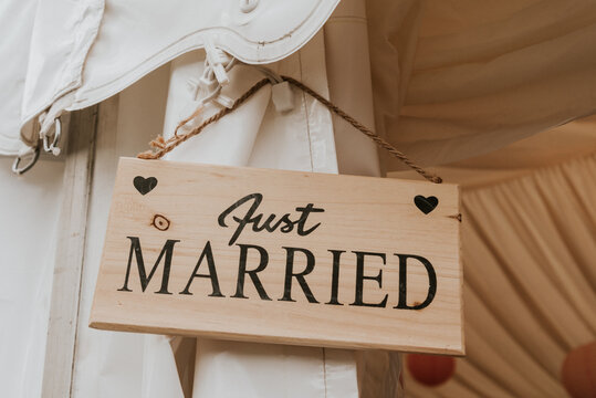 Just married sign at wedding reception.