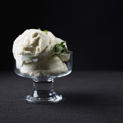 Ice-cream sundae, refreshing vanilla dessert for summertime. Food background with free space