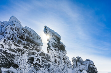 the rock is covered with snow in winter