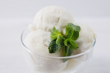 Ice-cream sundae, refreshing vanilla dessert for summertime. Tasty homemade food, culinary concept