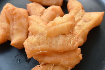 Chinese pastry dough arranging on plate  