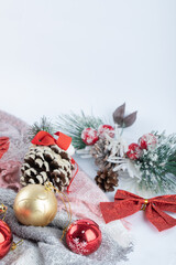 Christmas shiny baubles on white surface