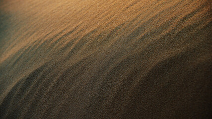Fototapeta premium dark sand surface in dunes at sunset.