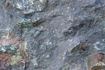 The surface of the ore is magnetite, iron. Teiskoye deposit. Kuznetsk Alatau, Republic of Khakassia, Russia.