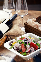 Beautifully decorated catering banquet table with different food snacks and appetizers