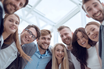 close up. group of smiling young people looking at the camera .