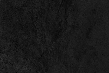 Dark grey black slate background or texture. Black granite slabs background