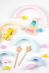Colorful sustainable zero waste educational toys for baby kids on white background. Top view, flat lay
