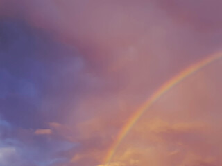 Fototapeta premium detail of rainbow rainbow in pink and violet sky colors 