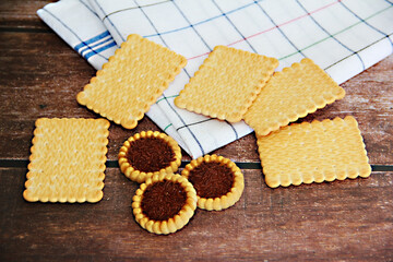 salty square cracker and sweet cookies