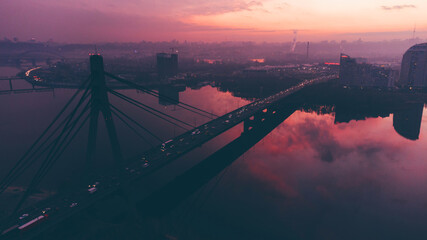 Aerial view of Dnipro River, Obolon district and the Pivnichnyi Bridge, Kyiv, Ukraine