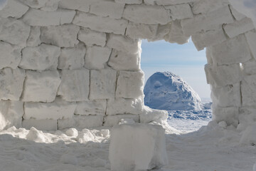 Winter dwelling of Eskimos inside view. Igloo. Eskimos village.