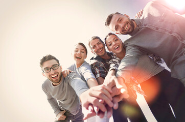 creative team,with hands clasped together