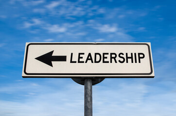 Leadership road sign, arrow on blue sky background. One way blank road sign with copy space. Arrow on a pole pointing in one direction.