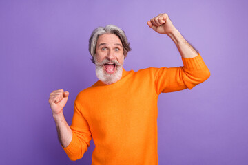 Photo of aged man happy positive smile excited rejoice win victory lucky success isolated over violet color background