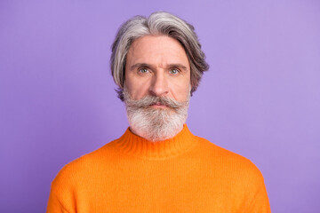 Photo of mature business man serious confident beard wear sweater fall isolated over violet color background