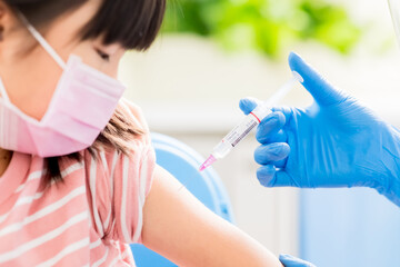 doctor making COVID19 vaccination