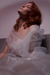 portrait of a ginger woman in dress