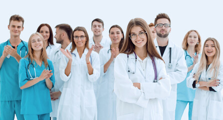 Fototapeta premium top view. a group of smiling doctors pointing at you.