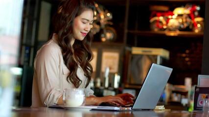 Happiness Attractive Asian woman working with computer laptop thinking to get ideas and requirement in Business startup at modern office or Co-working space,Business Startup Concept