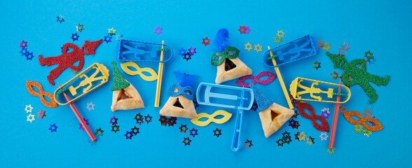 Purim celebration concept. Jewish carnival background. Top view. Flat lay