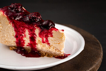 cheesecake with red fruit sauce
